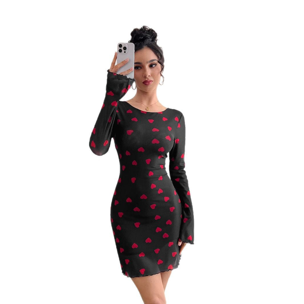 Women's figure-hugging mini dress made of fine mesh fabric with heart pattern and trumpet sleeves Mune Fashion