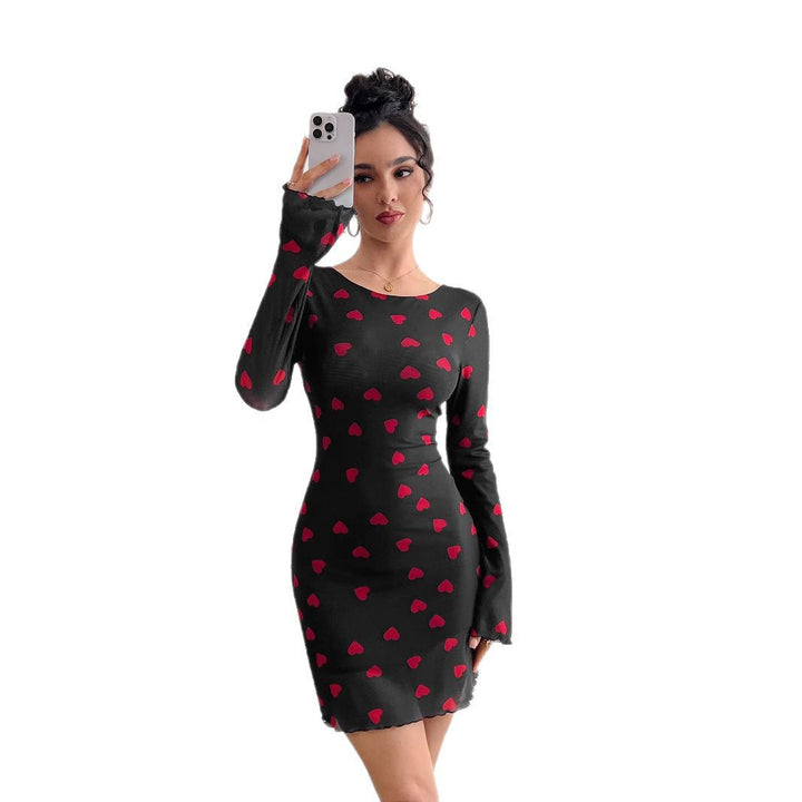 Women's figure-hugging mini dress made of fine mesh fabric with heart pattern and trumpet sleeves Mune Fashion
