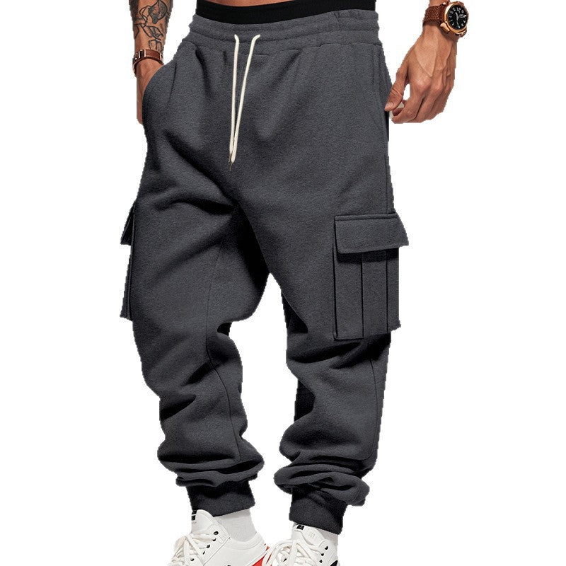 Men's cargo jogging pants with generous flap pockets, elastic waistband, and ribbed cuffs