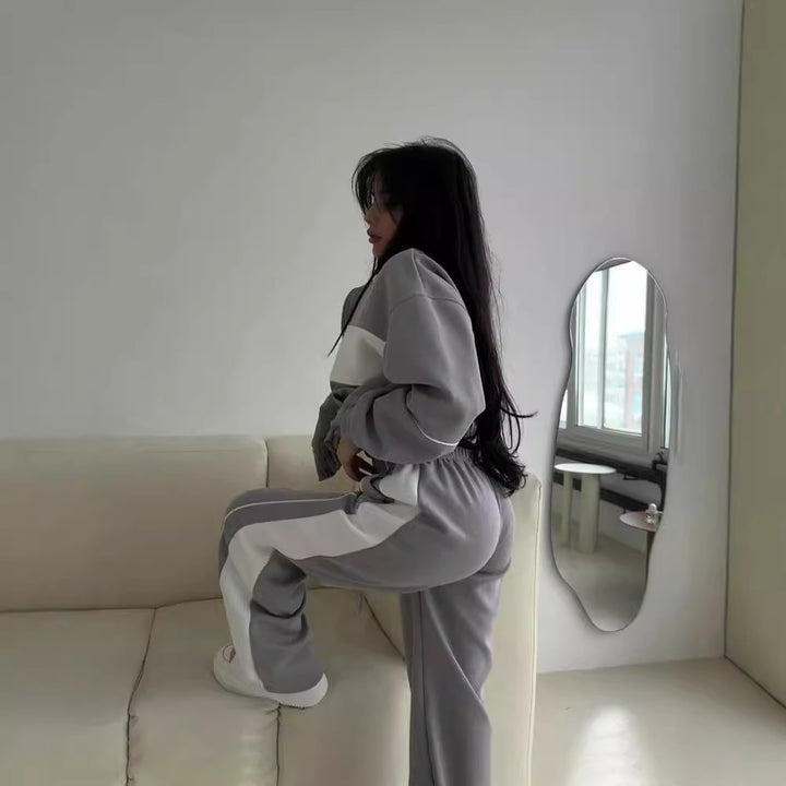 Women's nan sportives jogging suit set with full zip, contrasting chest panel, and wide comfort waistband Mune Fashion