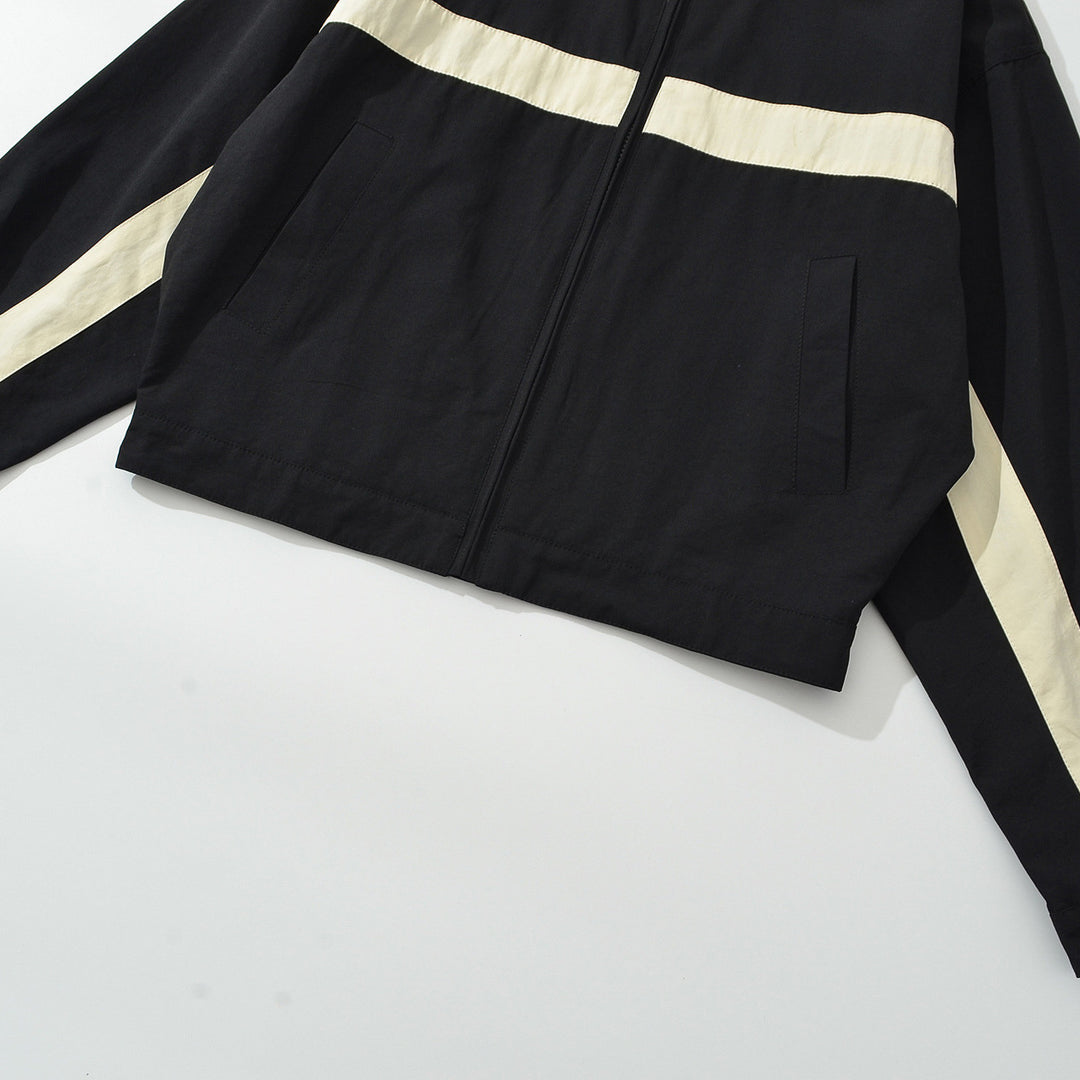 Women's sporty track jacket with high stand-up collar and contrasting stripes Mune Fashion