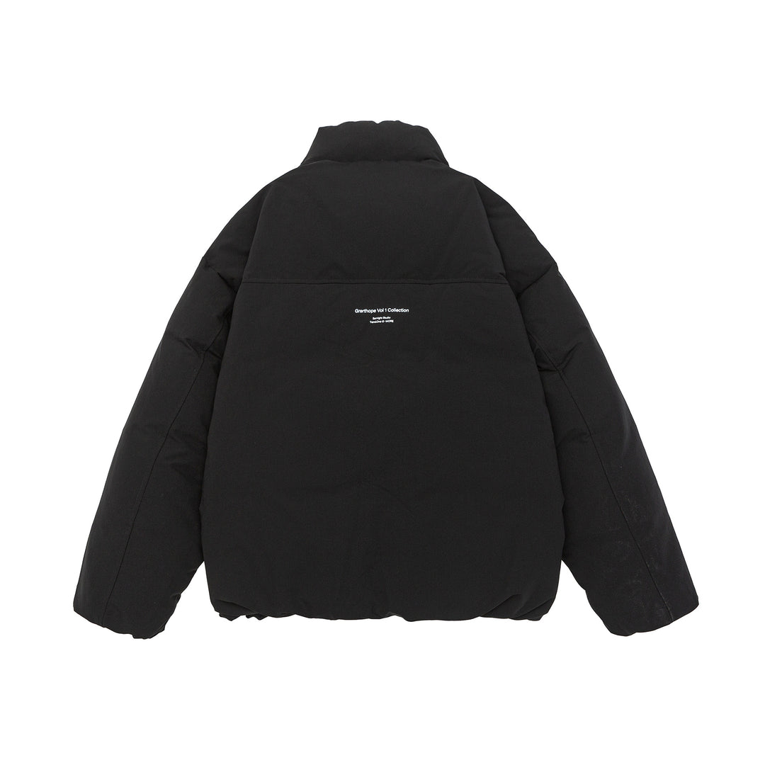 Women short cut oversized quilted jacket with high stand-up collar and concealed zipper Mune Fashion