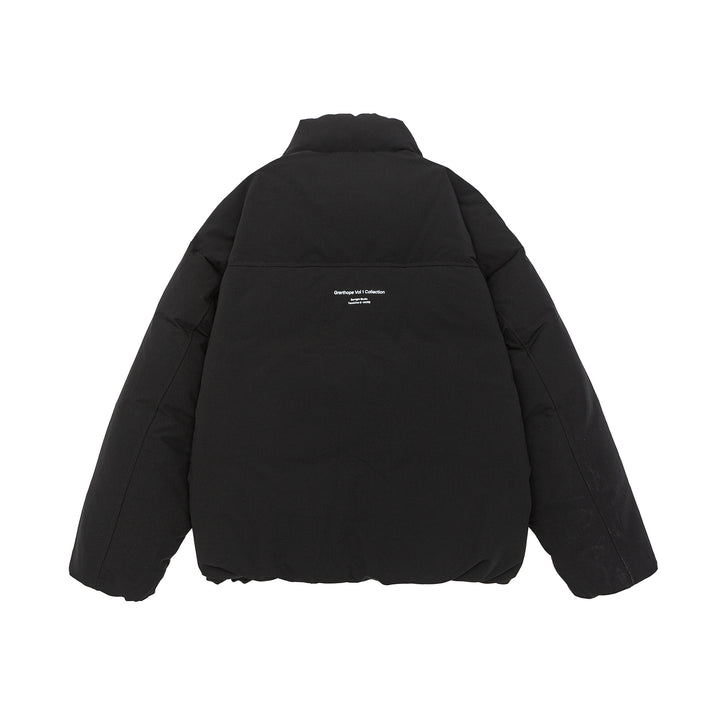 Women short cut oversized quilted jacket with high stand-up collar and concealed zipper Mune Fashion