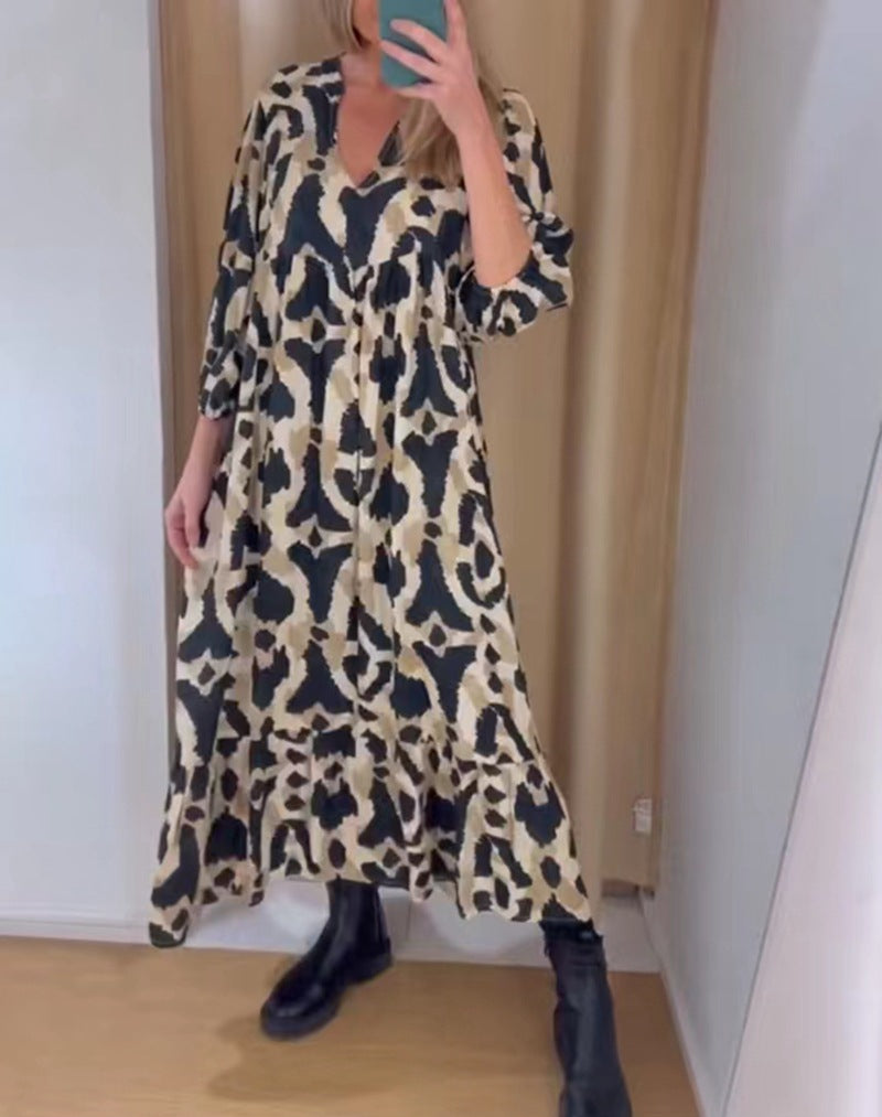 Women's flowing tiered maxi dress with V-neck, gathered bust panel and three-quarter sleeves Mune Fashion