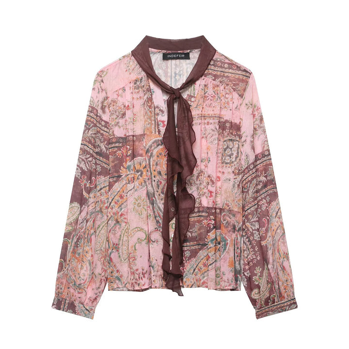 Women's chiffon blouse in paisley print with bow collar and ruffle front Mune Fashion