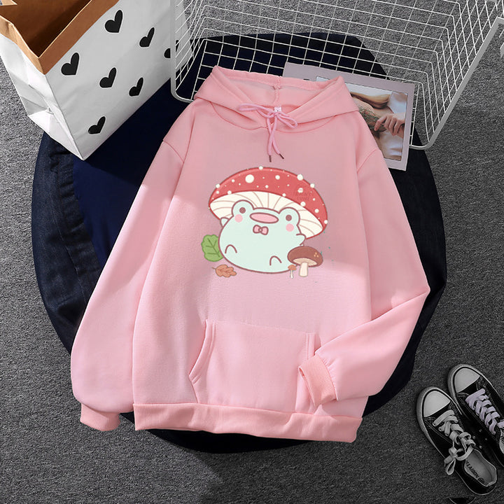 Women’s soft oversized hoodie with kawaii mushroom frog print, kangaroo pocket, and ribbed cuffs Mune Fashion