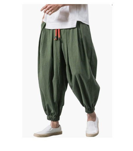 Men's wide-cut harem pants with low crotch, elastic waistband, and decorative drawstring Mune Fashion