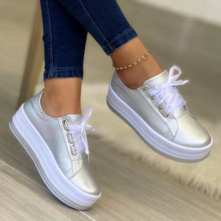 Women's platform sneakers with textured synthetic leather upper and extra high rubber platform Mune Fashion
