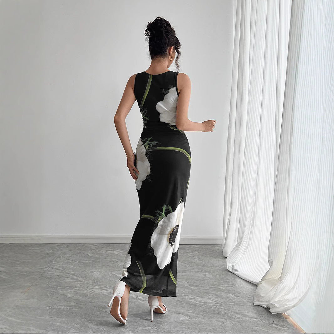 Women's form-fitting sleeveless maxi dress with photorealistic floral print and tailored silhouette Mune Fashion
