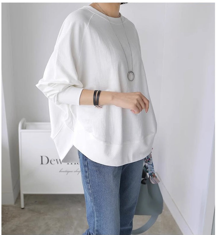 Women Oversize Sweatshirt with Raglan Sleeves, Rounded Hem and Side Slits Mune Fashion