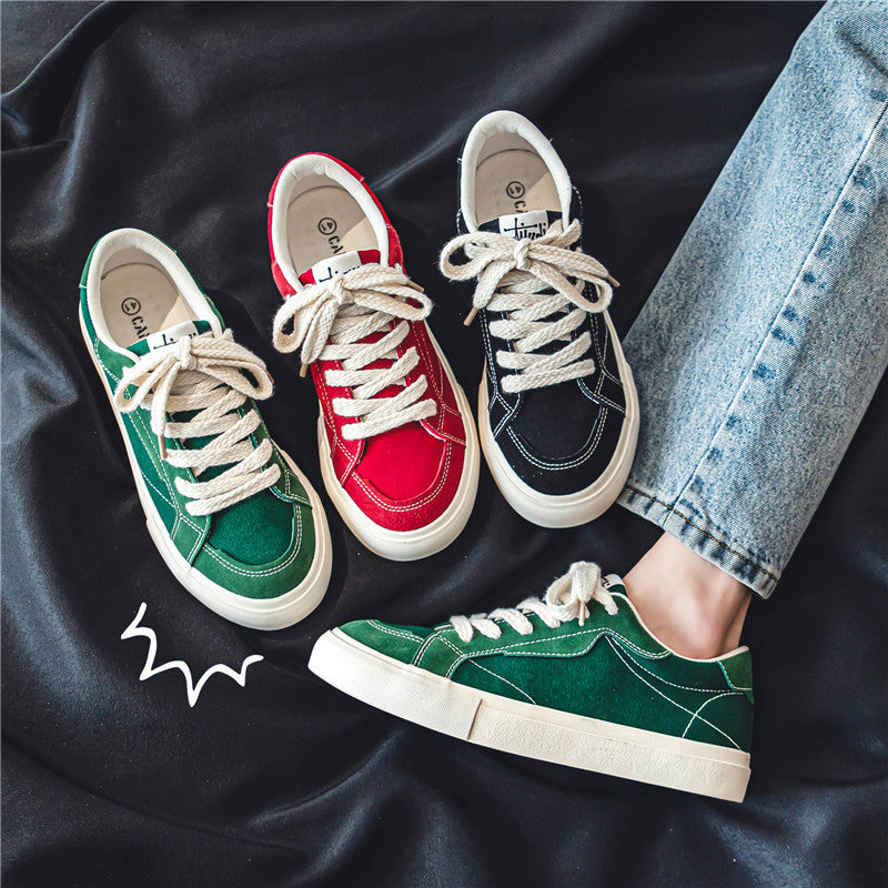 Unisex casual canvas low-top sneaker with contrasting decorative stitching and padded platform sole Mune Fashion