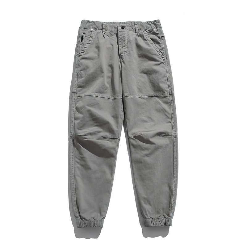 Men's tapered cargo pants in jogger style with knee seam details, drawstring & elastic cuffs