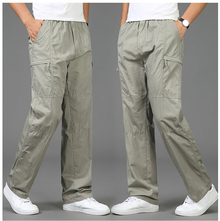 Women’s loose cargo pants with elastic waistband, multiple pockets and knee darts Mune Fashion