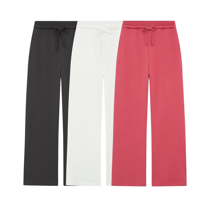 Women's wide high-waist palazzo pants with elastic waistband and flowing silhouette Mune Fashion