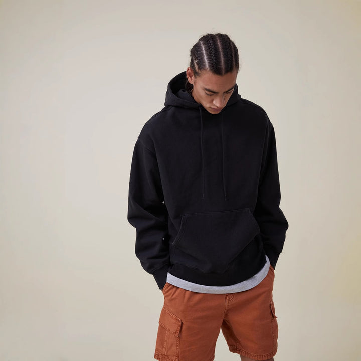 Women’s oversized hoodie dress with kangaroo pocket, extended silhouette and soft French terry Mune Fashion