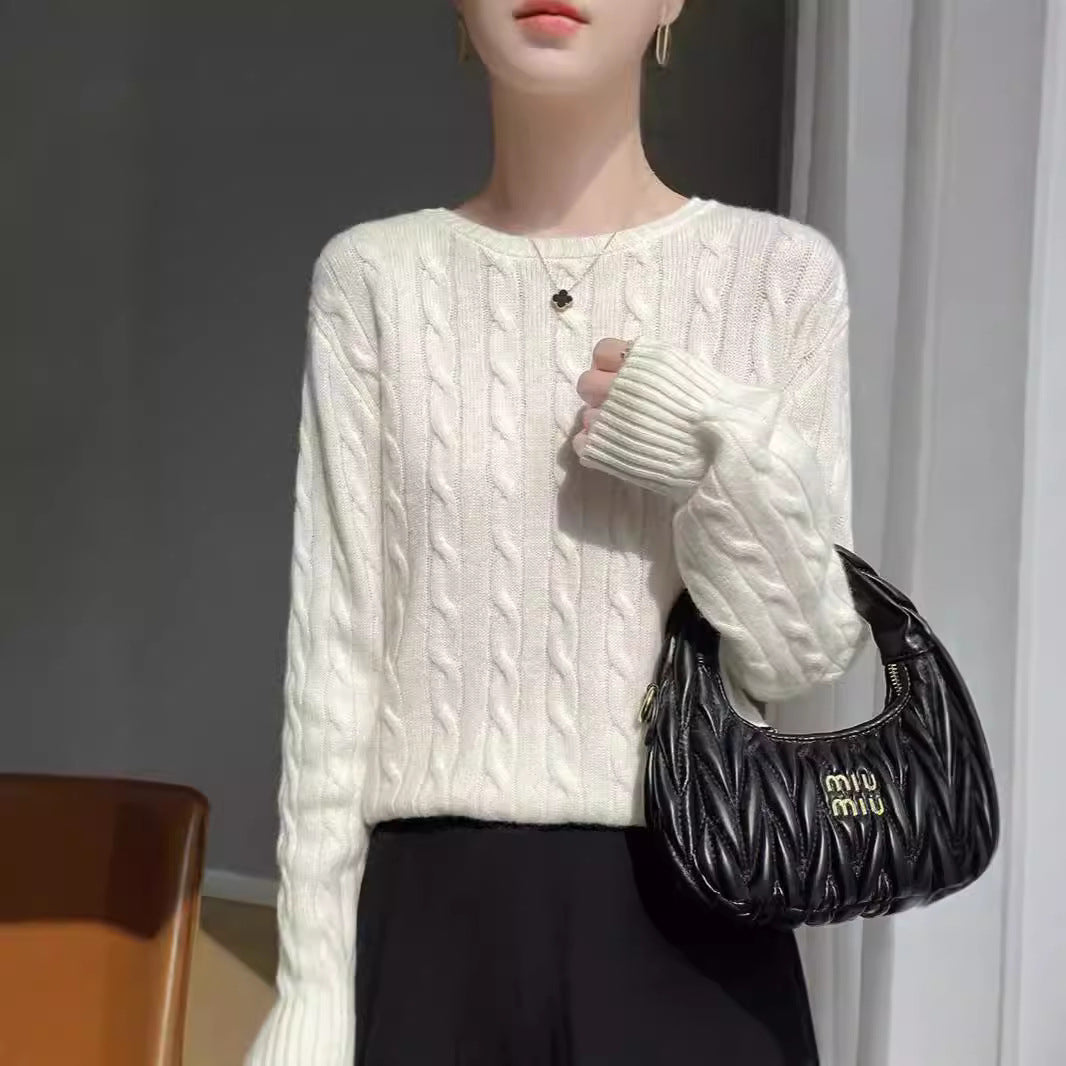 Women's cable knit round neck sweater made of soft wool blend with ribbed cuffs Mune Fashion