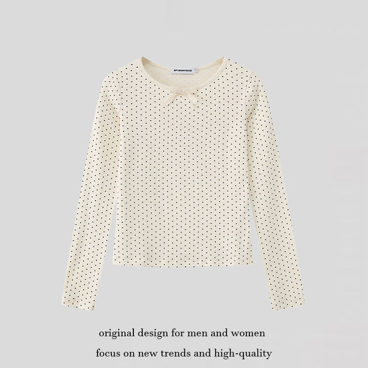 Women's long sleeve shirt made of soft cotton jersey with polka dot pattern and decorative knot on top