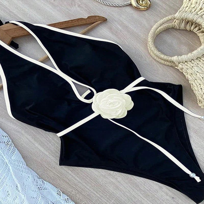 Women's one-piece swimsuit with innovative floral accent Mune Fashion