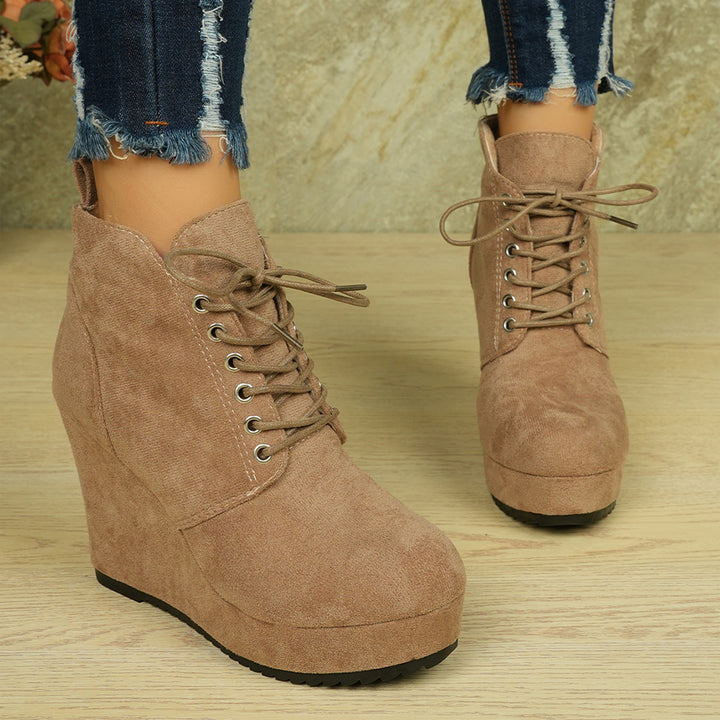 Women's faux fur lined wedge ankle boots with foldable fur collar, lacing and slip-resistant tread sole Mune Fashion
