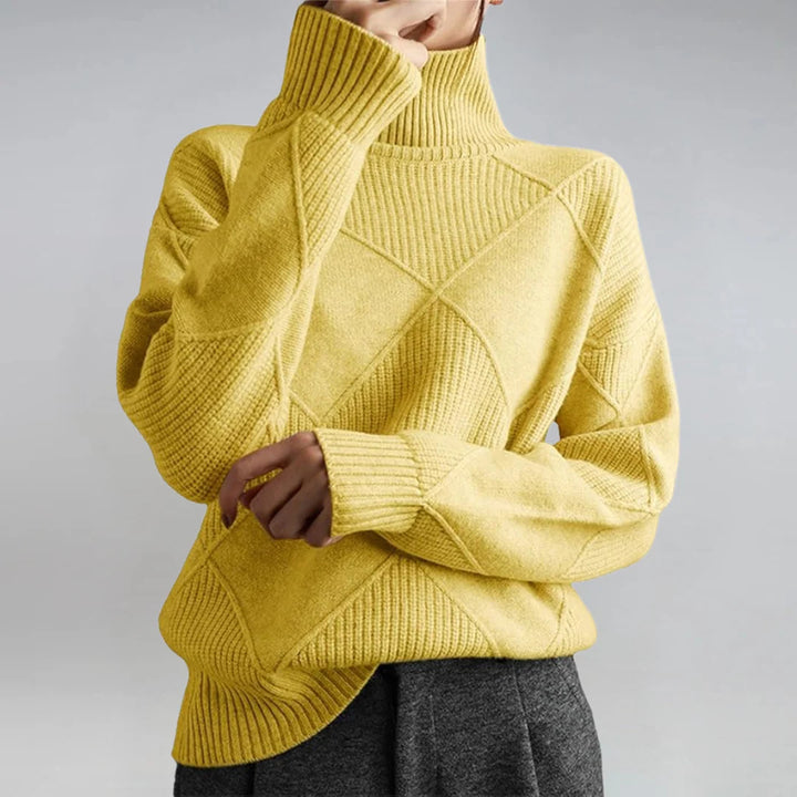 Women's oversized knitted sweater with high turtleneck and diamond pattern Mune Fashion