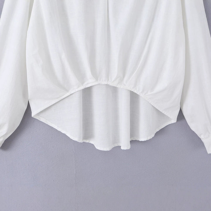 Women's loose cotton blouse with V-neck, shirt collar, and ruffled pointed hem Mune Fashion