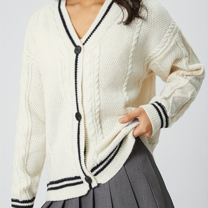 Women's oversized cable-knit cardigan with V-neck and contrasting knit edges Mune Fashion