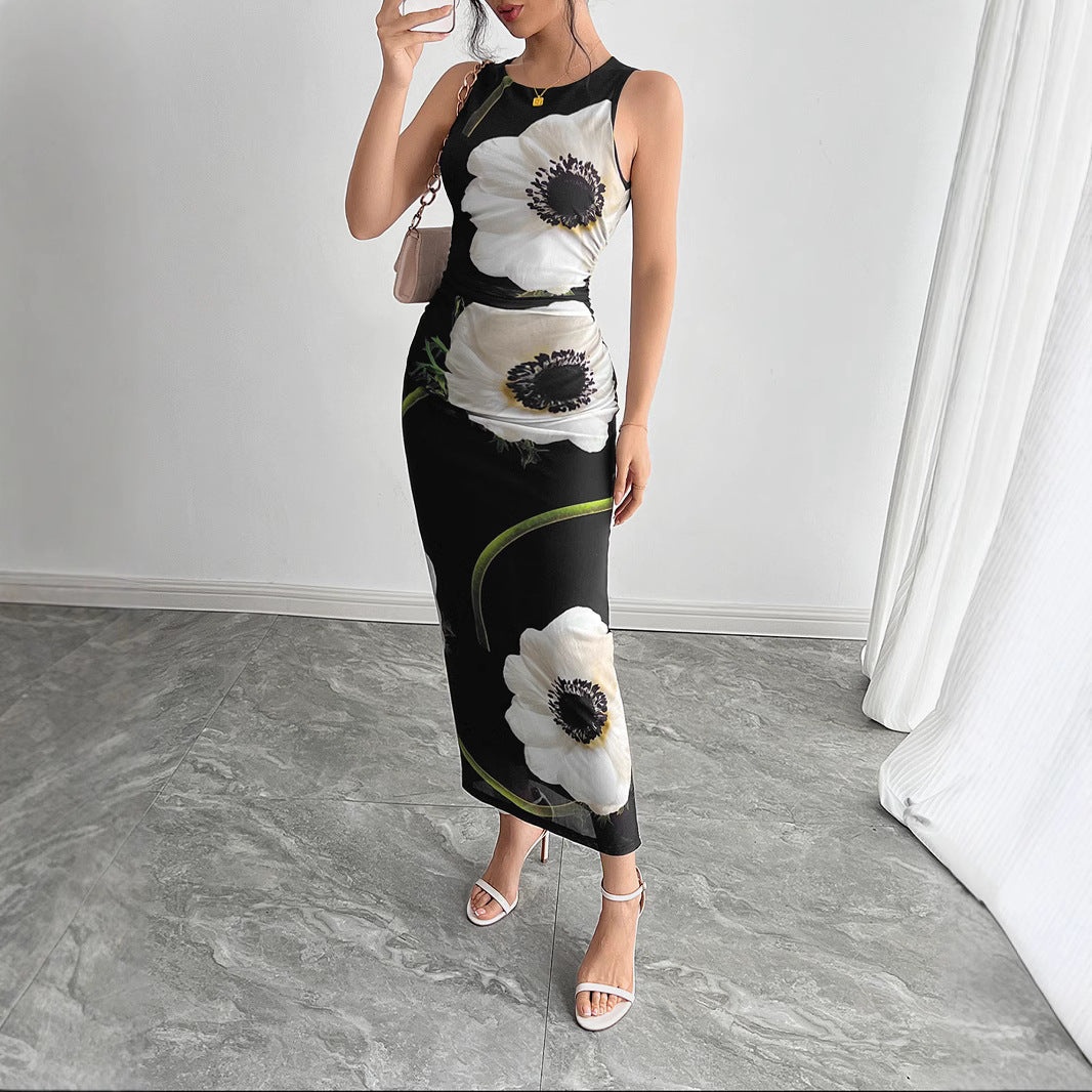 Women's form-fitting sleeveless maxi dress with photorealistic floral print and tailored silhouette Mune Fashion