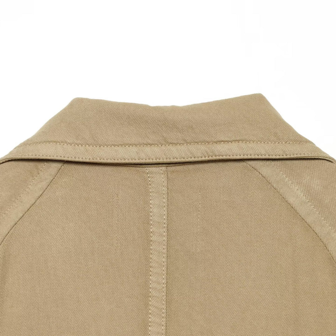 Women Cropped Trench Cape Jacket with double-breasted button placket, shoulder patches and tie belt Mune Fashion