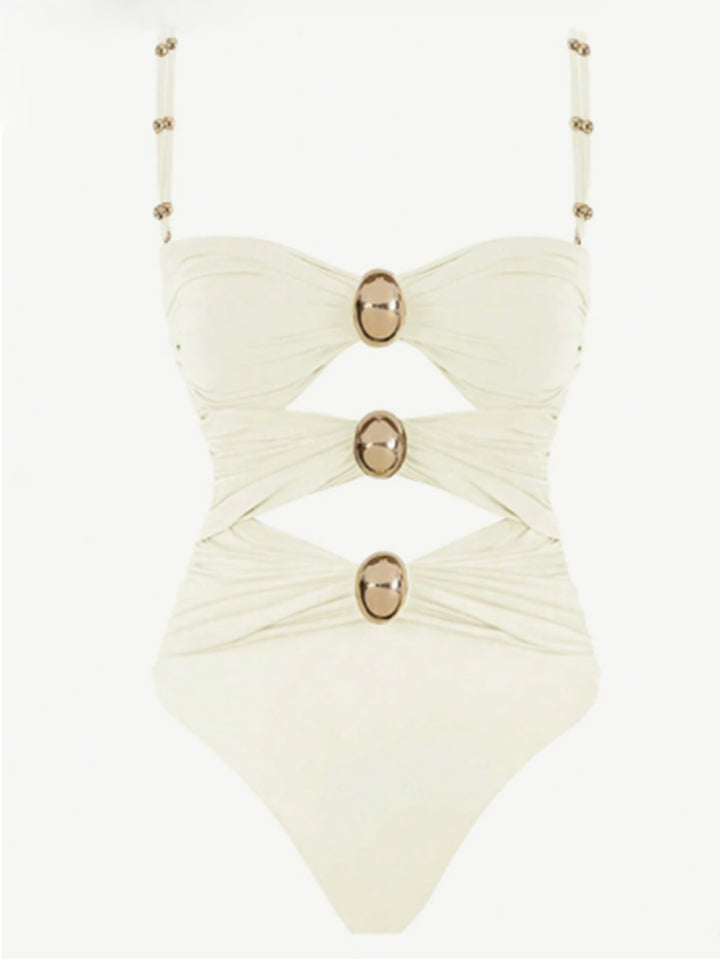Women's one-piece swimsuit with intricate cut-outs and decorative metal accents Mune Fashion