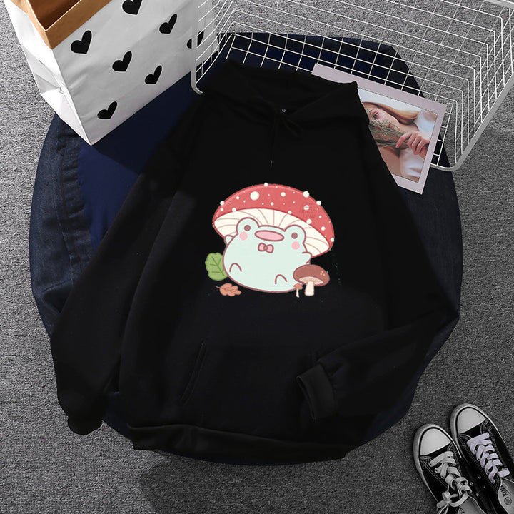 Women’s soft oversized hoodie with kawaii mushroom frog print, kangaroo pocket, and ribbed cuffs Mune Fashion