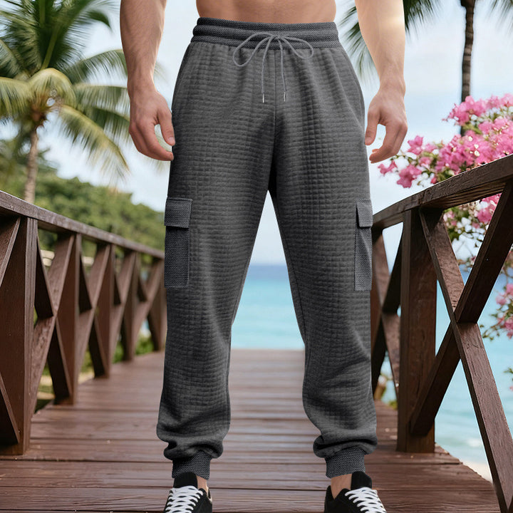 Men's Textured Cargo Jogging Pants with Drawstring, Snap Flap Pockets and Ribbed Cuffs Mune Fashion