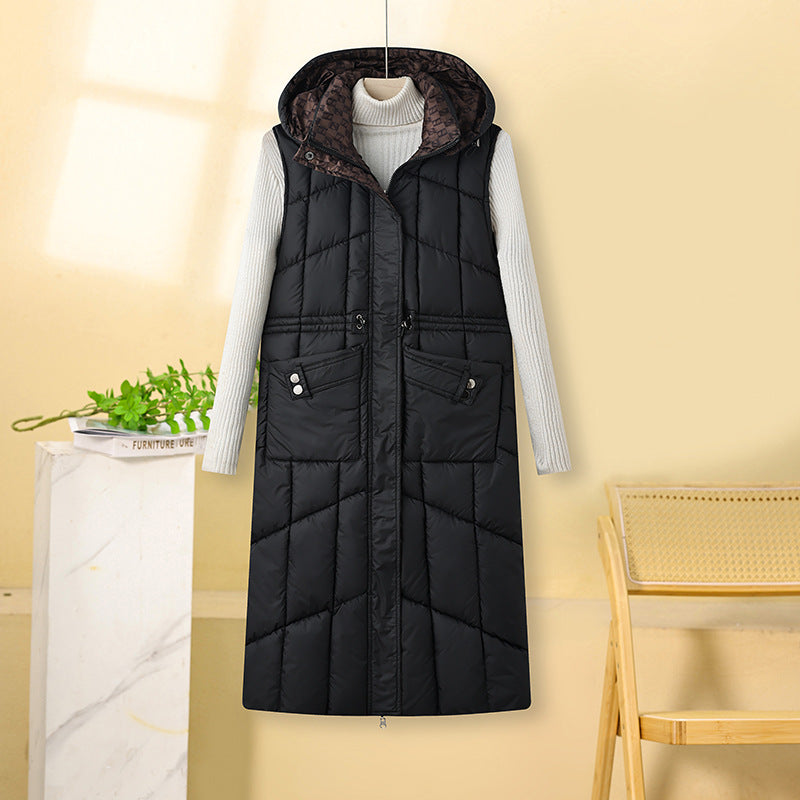 Ladies long sleeveless thermo quilted coat with hood, adjustable drawstring waist and multifunctional pockets Mune Fashion