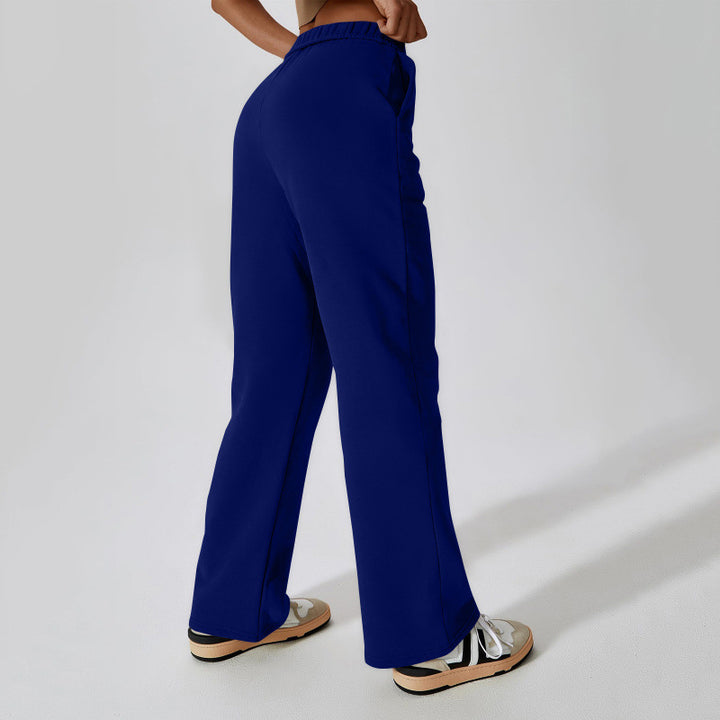 Women high-waisted flared lounge pants with elastic comfort waistband and concealed pockets Mune Fashion