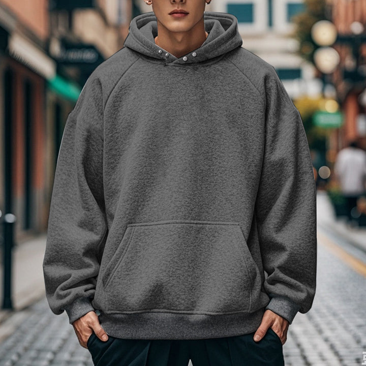 Men's oversized hoodie with kangaroo pocket, raglan sleeves, and ribbed cuffs Mune Fashion