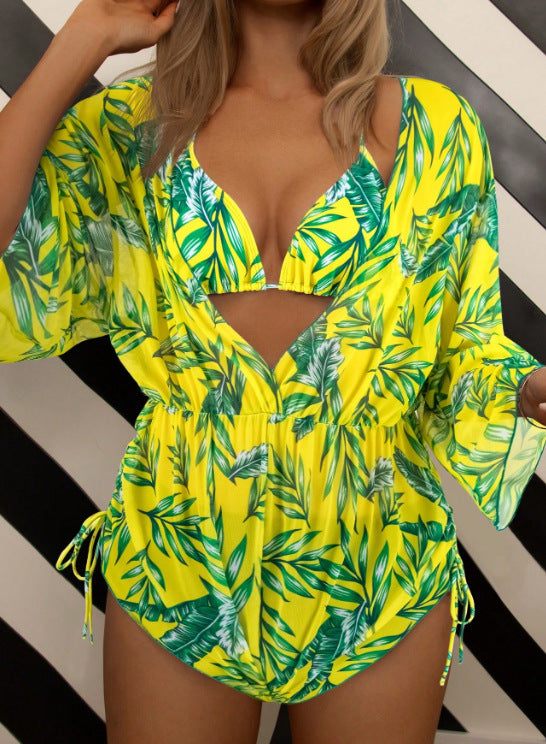 Women's swimsuit with elegant V-neckline and playful palm print Mune Fashion