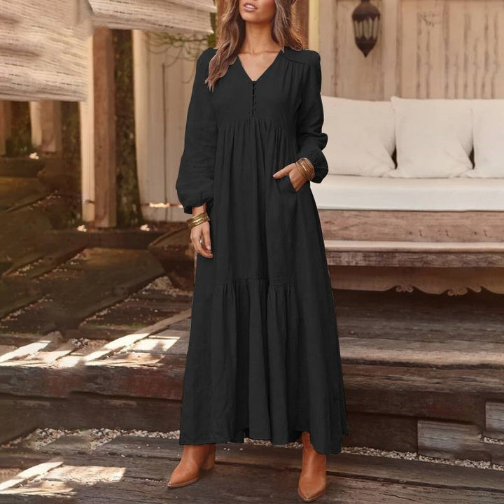 Women's airy maxi dress with V-neck, long sleeves, and side pockets Mune Fashion