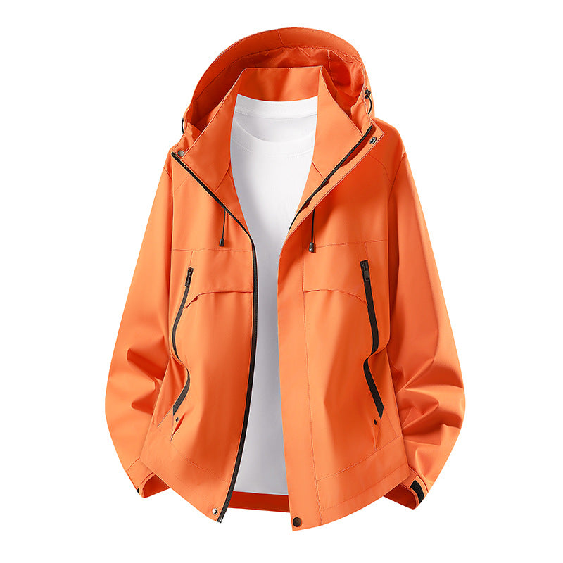 Women's lightweight waterproof hooded jacket with breathable coating, zippered pockets, and adjustable cuffs Mune Fashion