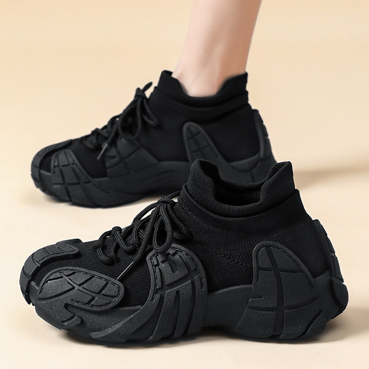 Men's sneaker made of solid material with sock-like knit shaft, molded rubber applications, and traction profile sole Mune Fashion