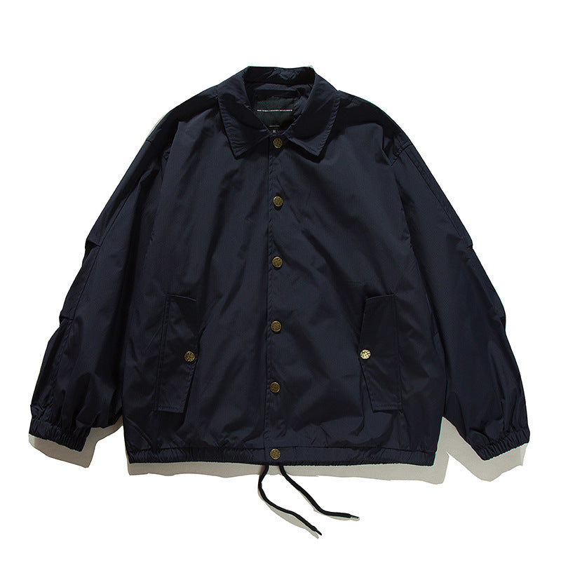 Unisex Boxy transitional bomber jacket with drawstring hem and snap button placket Mune Fashion
