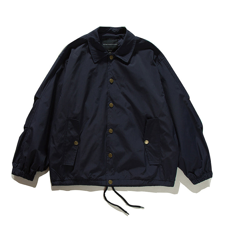 Unisex Boxy transitional bomber jacket with drawstring hem and snap button placket Mune Fashion