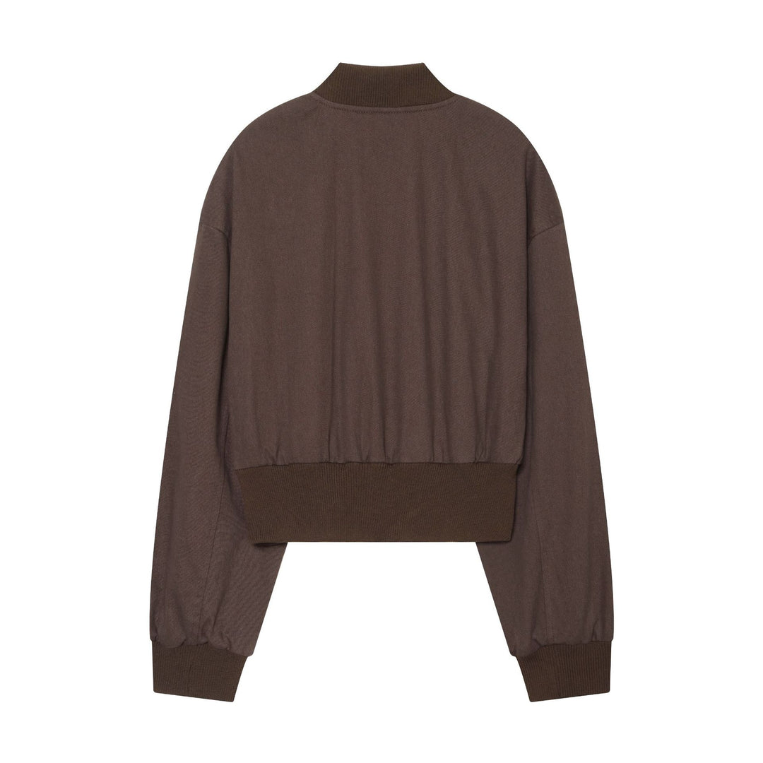 Women's cropped bomber jacket with wide ribbed waistband, metal zipper, and oversized sleeves Mune Fashion