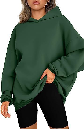 Women's oversized hoodie in longline cut with raglan sleeves and soft inner lining Mune Fashion