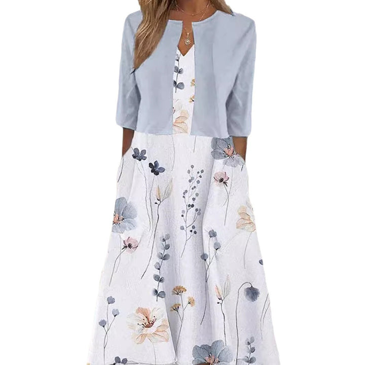 Women's midi dress with bolero look, fitted V-neck, three-quarter sleeves, and floral A-line skirt Mune Fashion