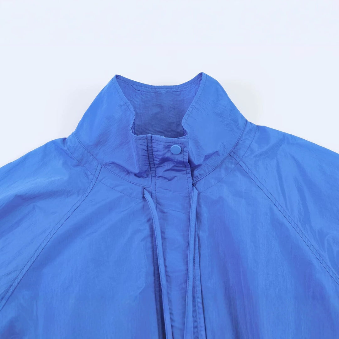 Women's Lightweight Wind and Travel Jacket with Stand Collar, Concealed Snap Placket and Drawstring Hem Mune Fashion