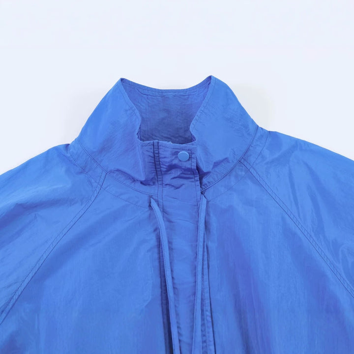 Women's Lightweight Wind and Travel Jacket with Stand Collar, Concealed Snap Placket and Drawstring Hem Mune Fashion