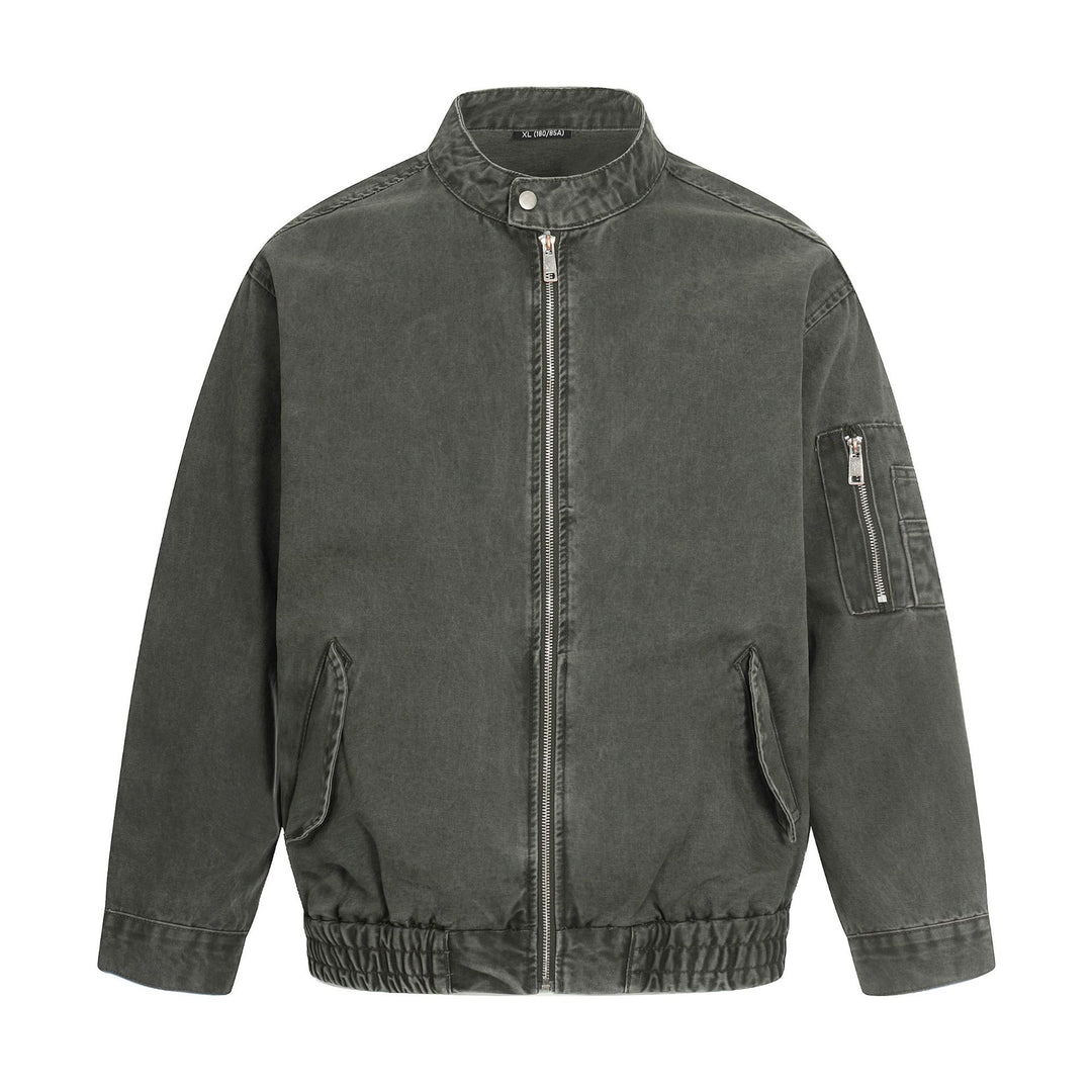 Men's short cut vintage-wash bomber jacket in boxy cut with stand-up collar and sleeve zip.