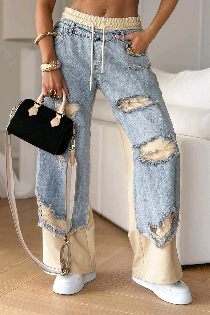 Women's loose patchwork jeans with elastic drawstring waistband, destroyed look and contrasting sweat inserts Mune Fashion