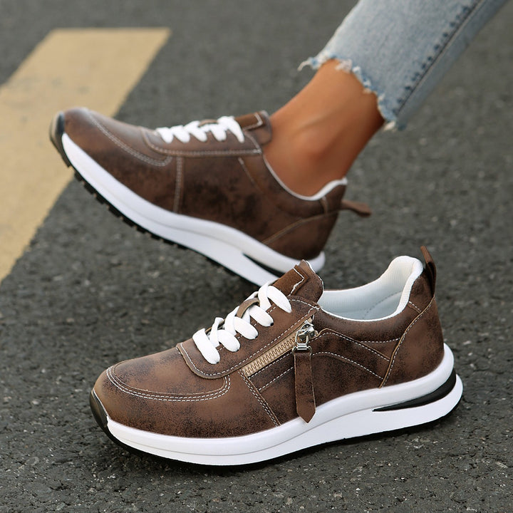 Women’s platform sneaker with zipper detail and padded comfort insole Mune Fashion