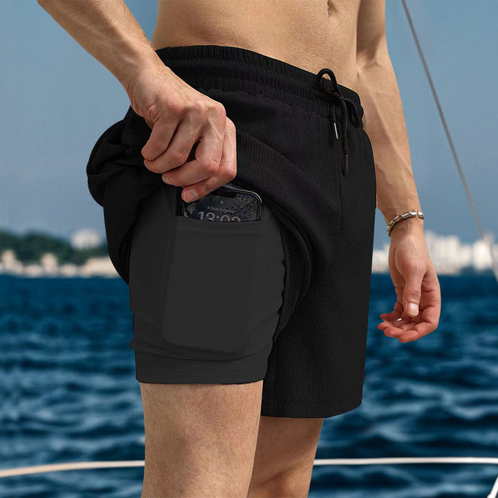 Men's two-layer swim shorts with integrated compression inner shorts and hidden cell phone pocket Mune Fashion