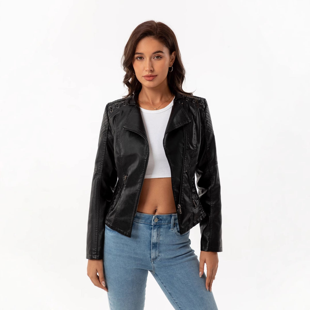 Ladies tailored faux leather biker jacket with quilted shoulder section, asymmetrical zipper and decorative eyelets Mune Fashion
